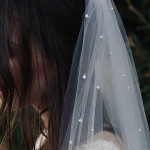 Wedding veil with pearls and a comb 🤍